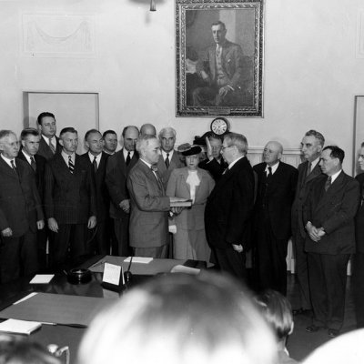 Harry S. Truman taking the oath of office at the White House after the death of President Roosevelt.